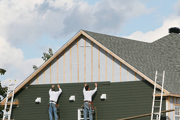 Professional Siding Replacement technician working in Bellville, TX